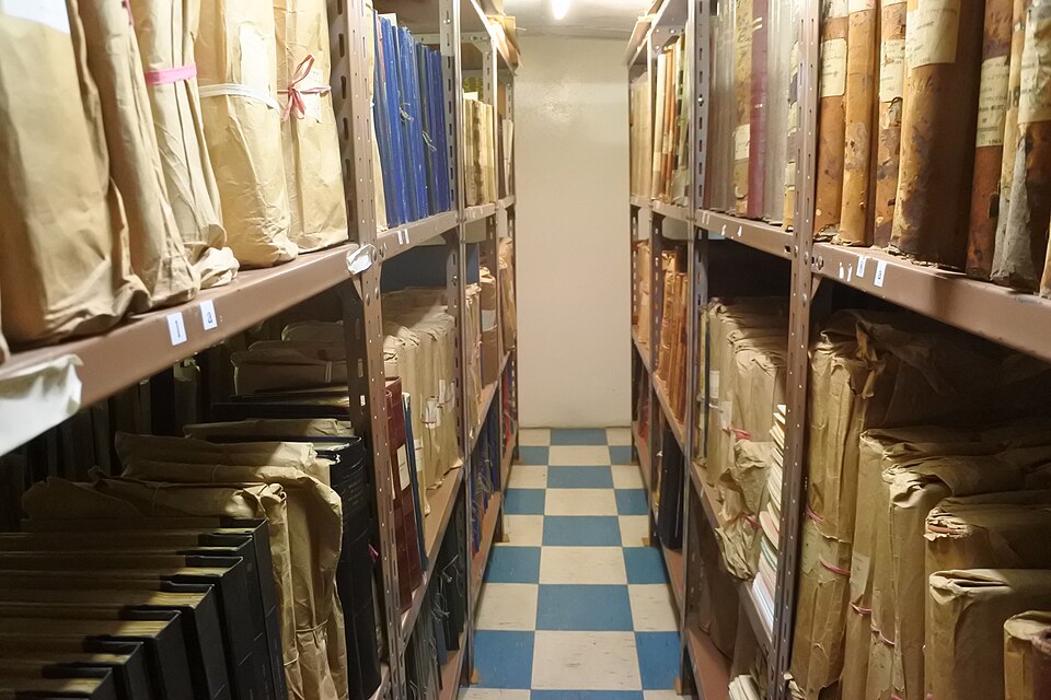 Shelves of bound records in the St Helena Archives.